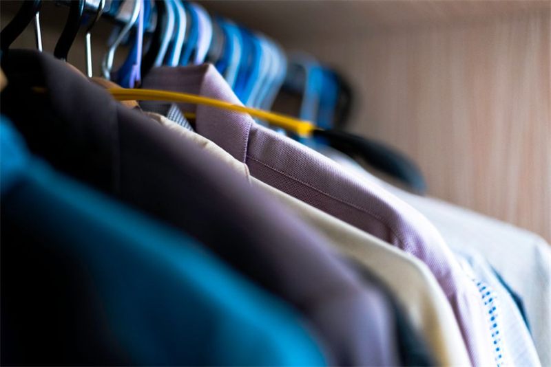 Shirts on hangers ready for professional dry cleaning